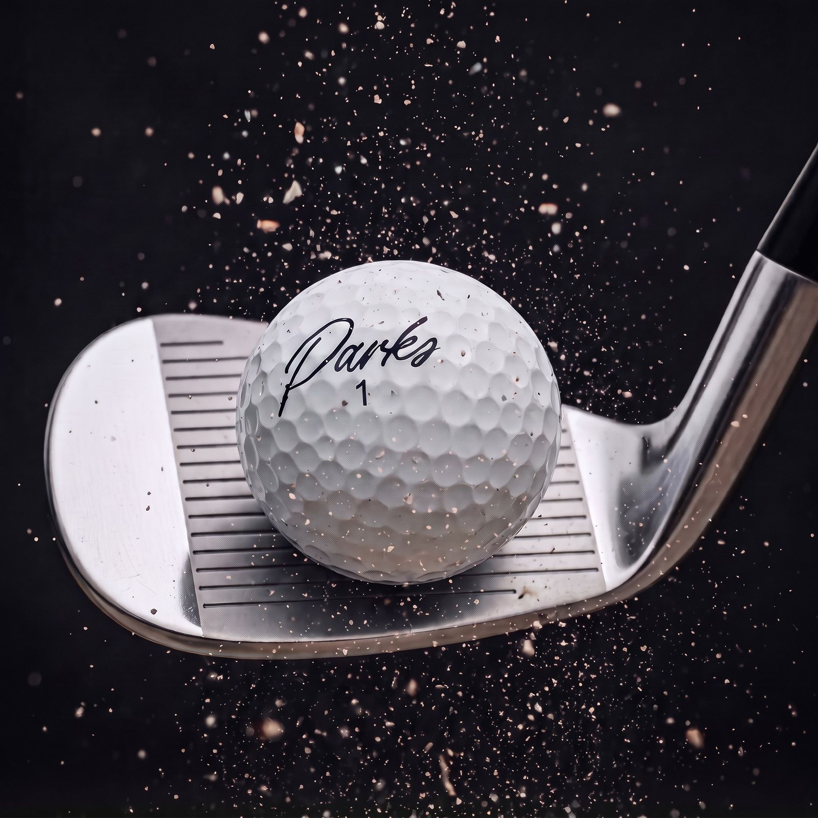 Iron striking a Parks golf ball